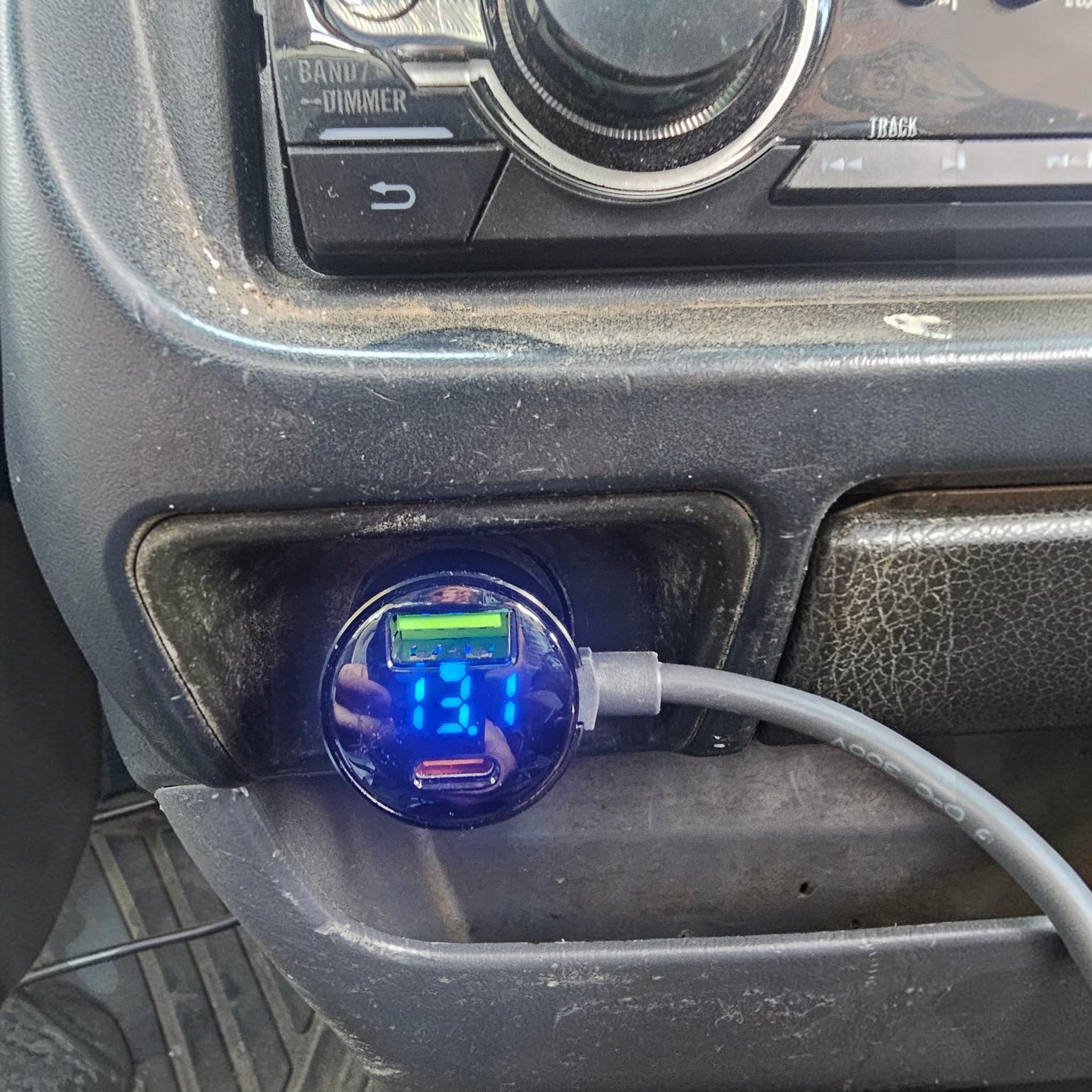 Cigarette Lighter power supply in use. Showing the Volts