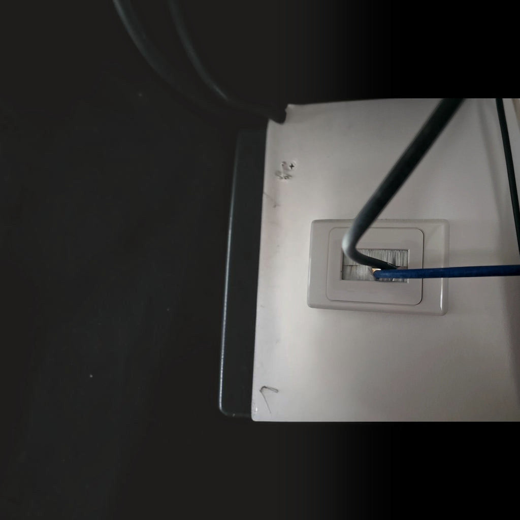 Showing the Brush Wall cover plate being iused with wires