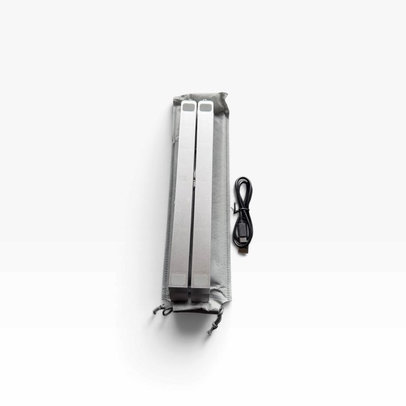 Get Mounted foldable silver laptop stand in a grey carrying pouch with a USB cable on a white background