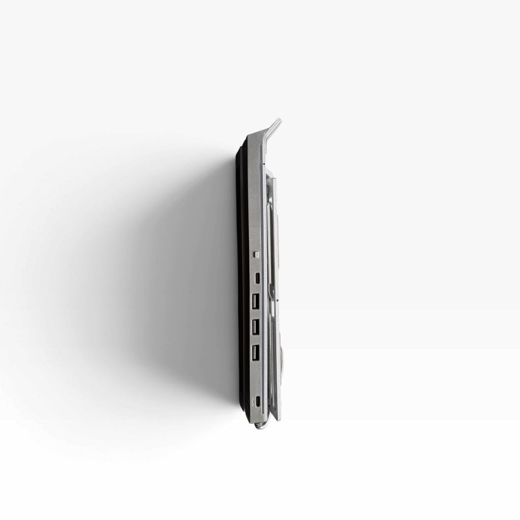 Get Mounted foldable silver laptop stand viewed from the side in its compact, closed position.
